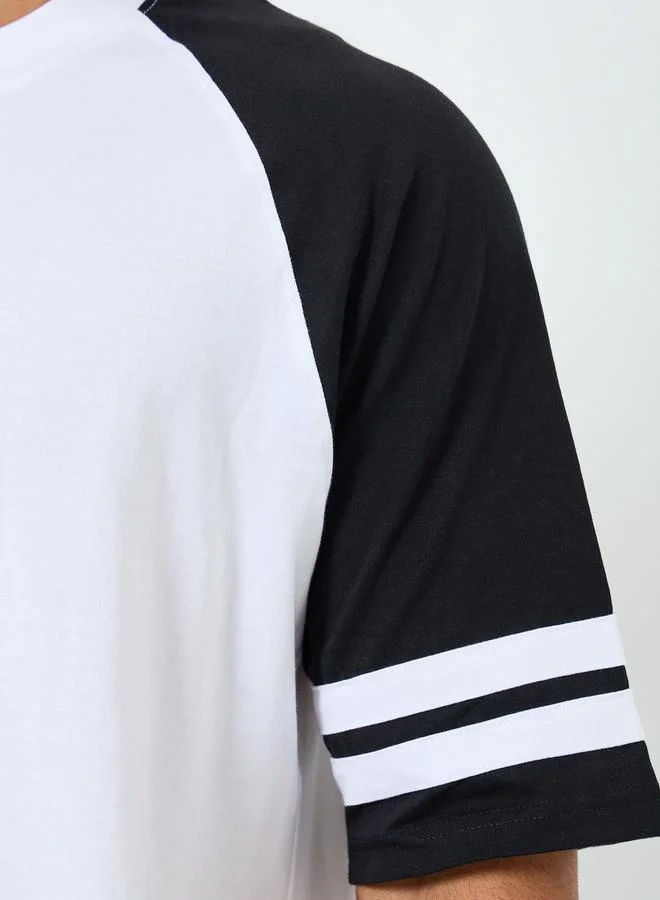 Styli Men Color Block Raglan Sleeve Oversized T-Shirt